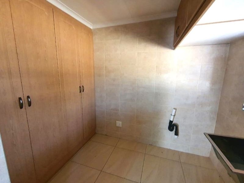 Charming 3-Bedroom Home on Corner Stand with Double Garage – Space, Comfort & Value in Secunda - Photo 9