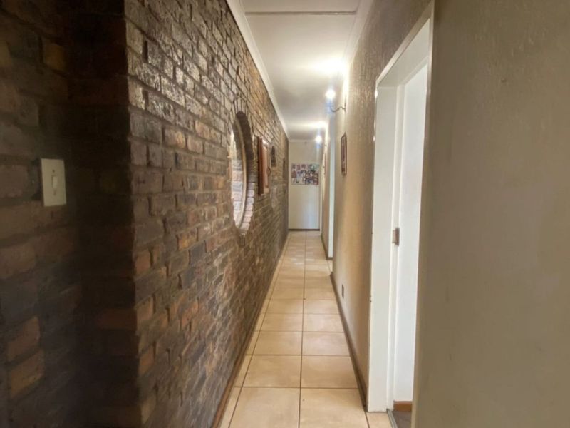 Spacious 4-Bedroom Family Home with Entertainment Extras in Trichardt - Photo 8