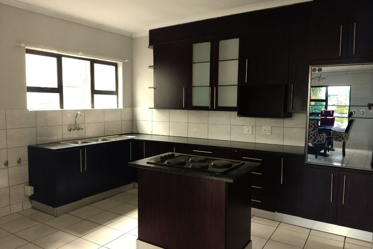 Elegant Double-Storey Living with Balconies & Built-In Braai - Photo 5