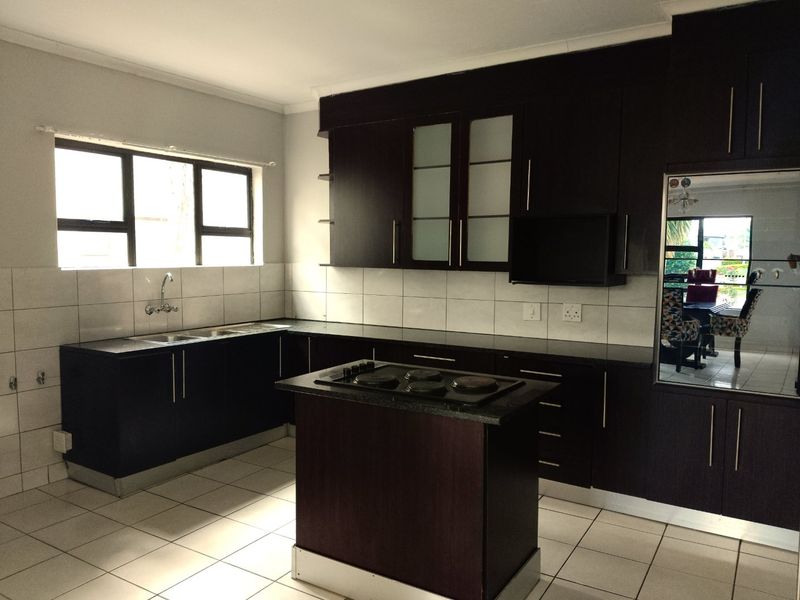 Elegant Double-Storey Living with Balconies & Built-In Braai - Photo 5