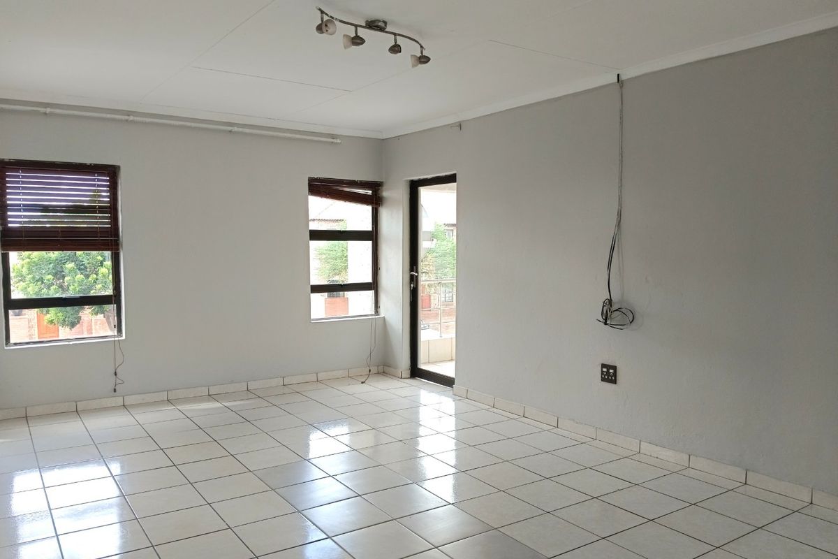 Elegant Double-Storey Living with Balconies & Built-In Braai - Photo 4