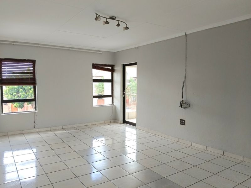 Elegant Double-Storey Living with Balconies & Built-In Braai - Photo 4