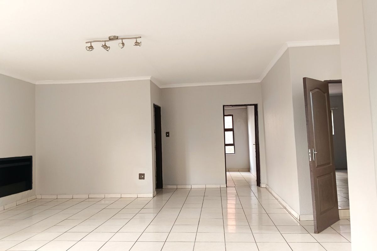 Elegant Double-Storey Living with Balconies & Built-In Braai - Photo 3