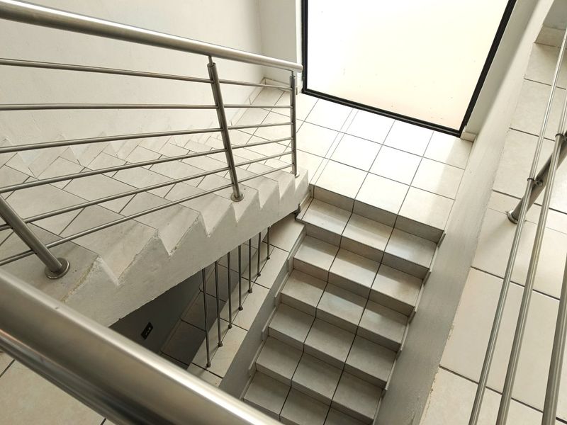 Elegant Double-Storey Living with Balconies & Built-In Braai - Photo 8