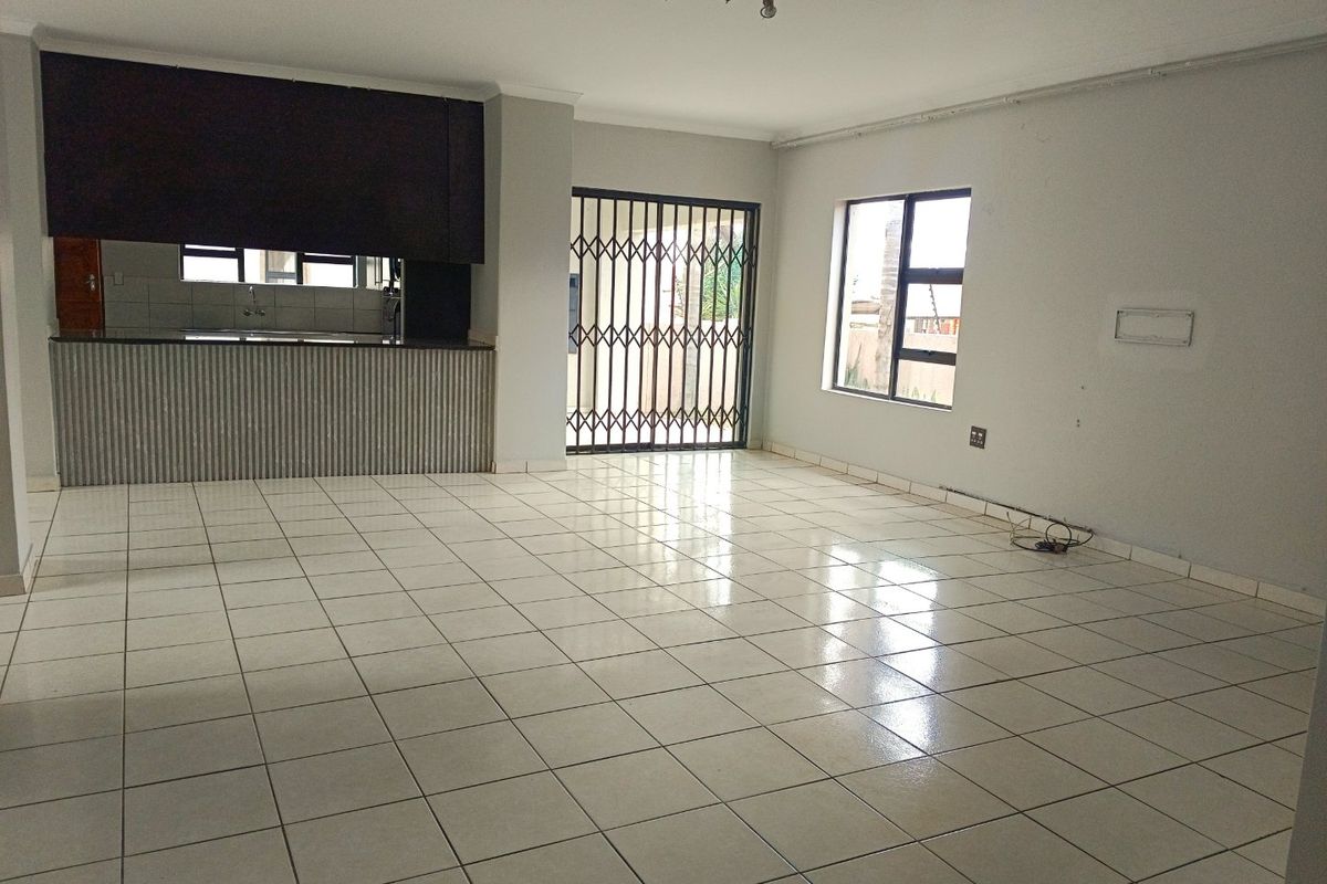 Elegant Double-Storey Living with Balconies & Built-In Braai - Photo 2