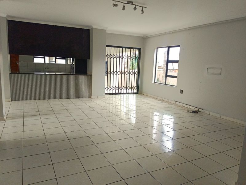 Elegant Double-Storey Living with Balconies & Built-In Braai - Photo 2