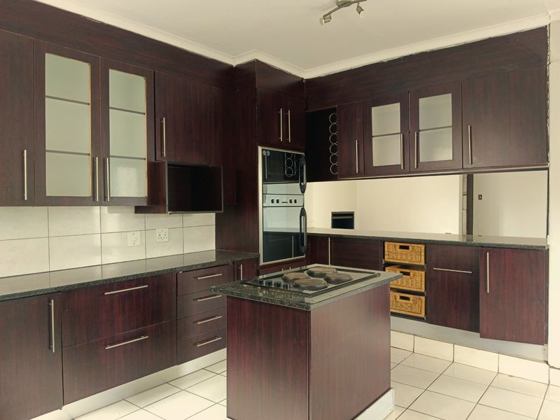 Elegant Double-Storey Living with Balconies & Built-In Braai - Photo 6