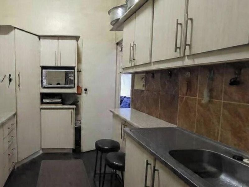 “A wonderful opportunity for the new owner to add their personal touch with simple cosmetic updates.  solid home offering great potential for modern upgrades.” - Photo 6