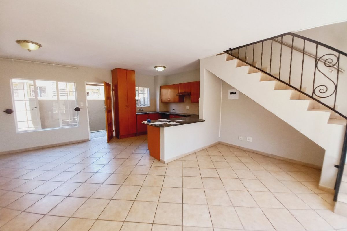 Neat and Secure 2 Bedroom Duplex in the Popular Glen Gardens Complex - Photo 2