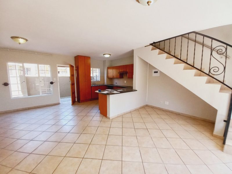 Neat and Secure 2 Bedroom Duplex in the Popular Glen Gardens Complex - Photo 2