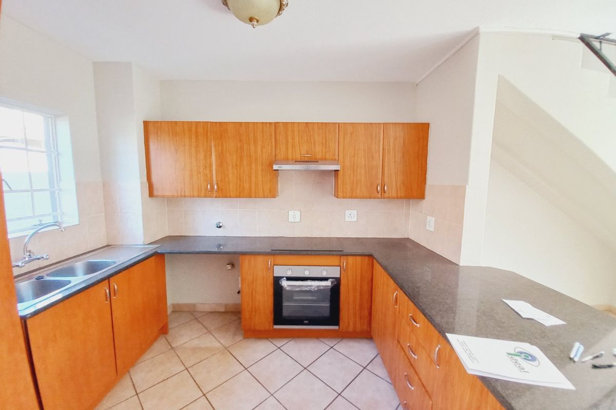 Neat and Secure 2 Bedroom Duplex in the Popular Glen Gardens Complex - Photo 3