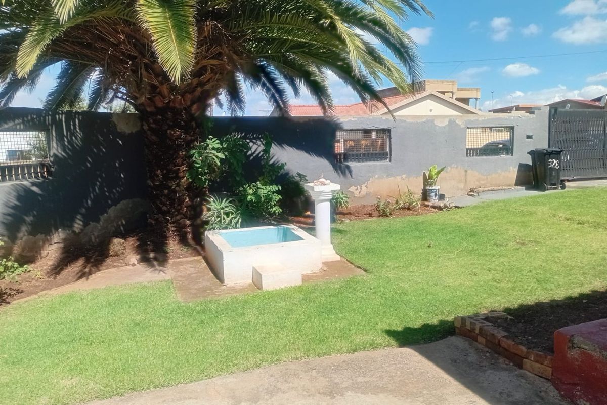 Great Investment Property: 2-Bedroom House with 4 Outside Rooms - Photo 2