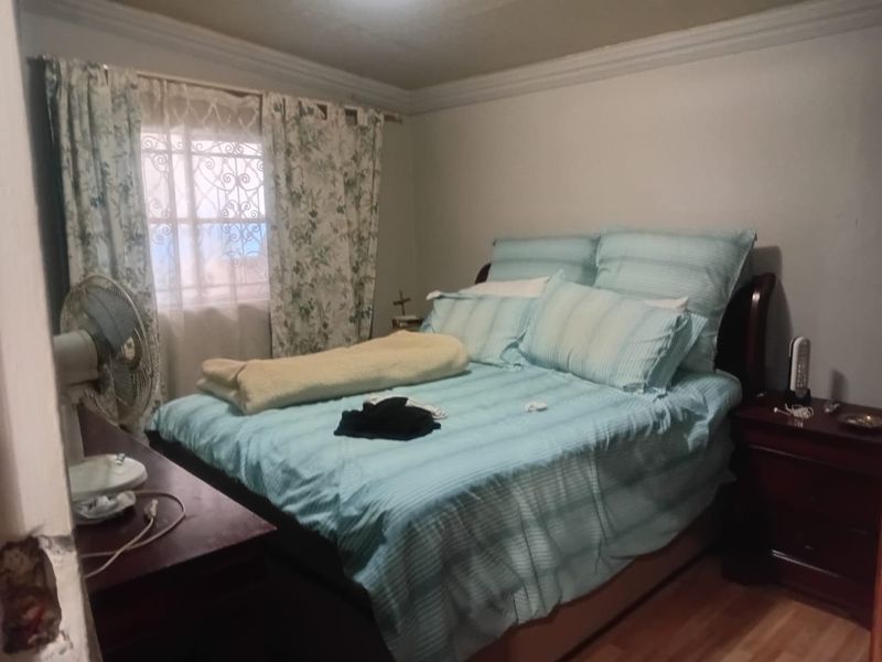 Great Investment Property: 2-Bedroom House with 4 Outside Rooms - Photo 8