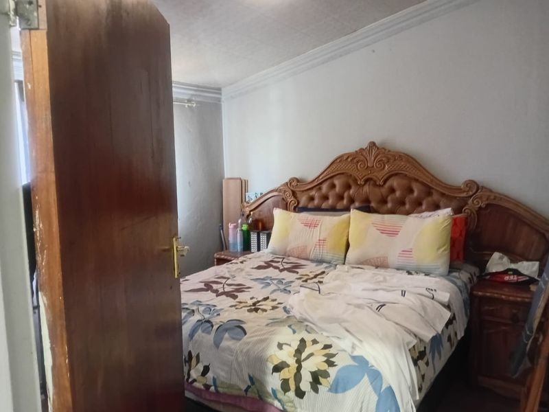 Great Investment Property: 2-Bedroom House with 4 Outside Rooms - Photo 9