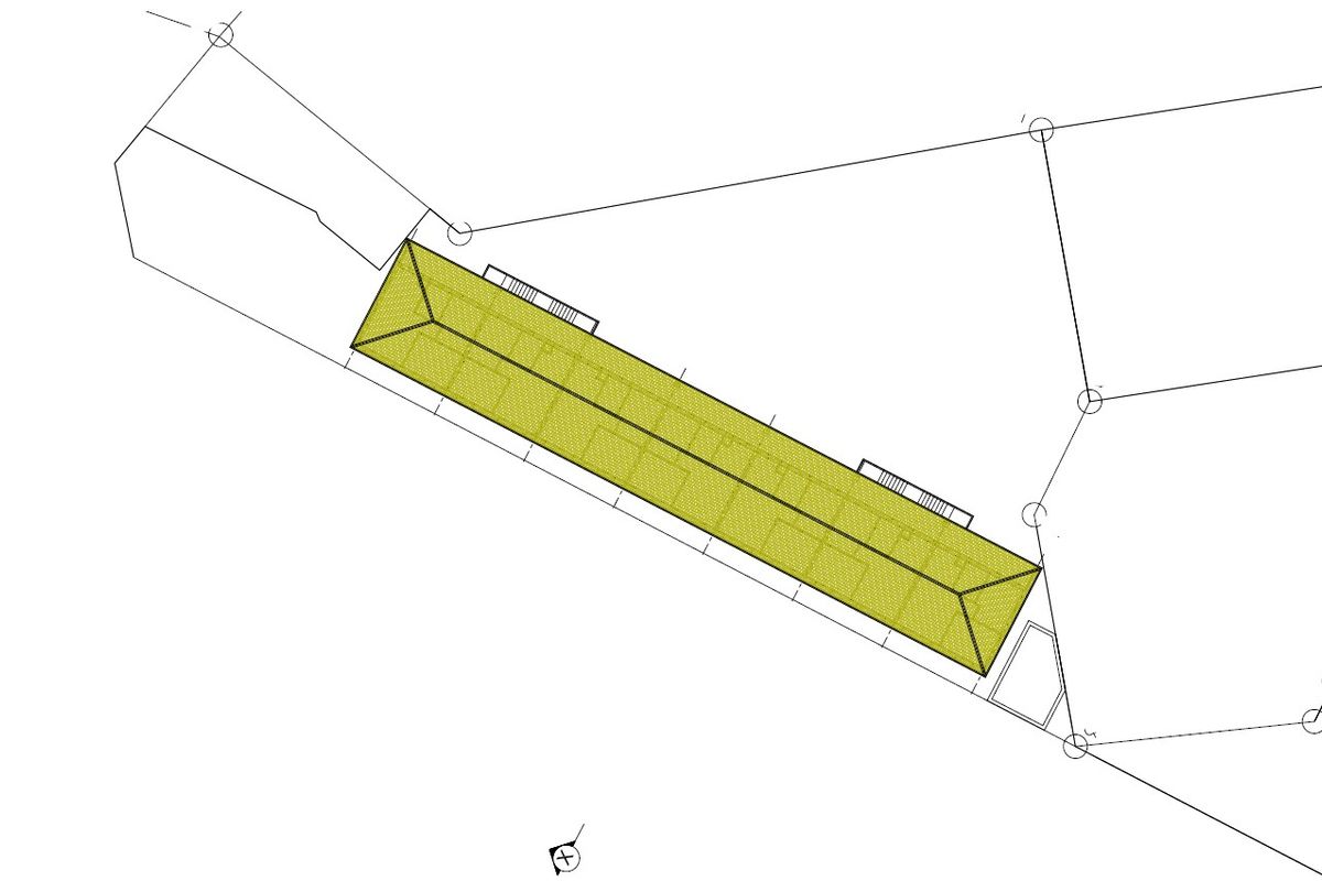 A site plan showing the footprint of a rectangular building structure on the residential plot.
