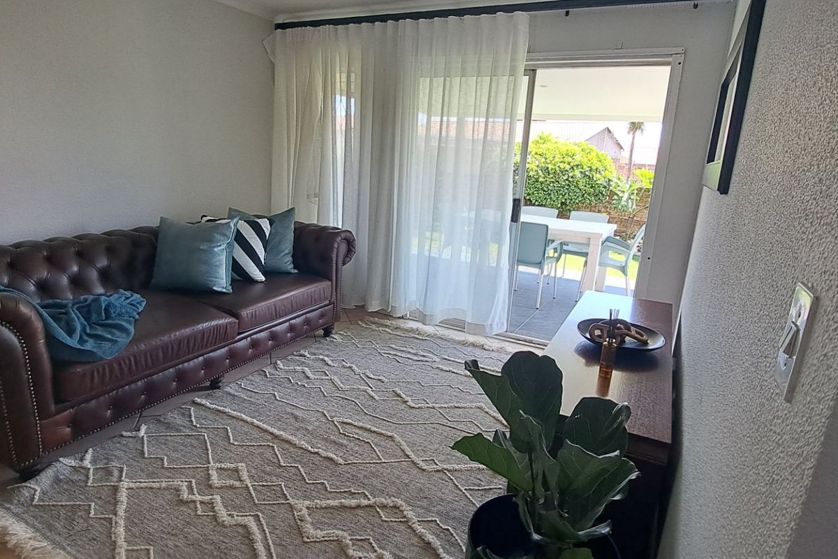 This beautifully renovated simplex is a must-see for discerning buyers seeking comfort, style, and security.  - Photo 2