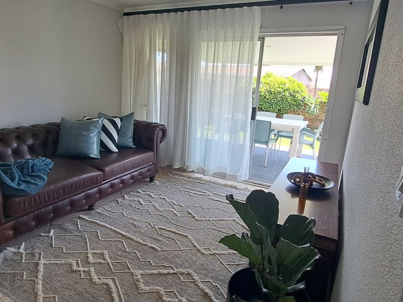 This beautifully renovated simplex is a must-see for discerning buyers seeking comfort, style, and security.  - Photo 2