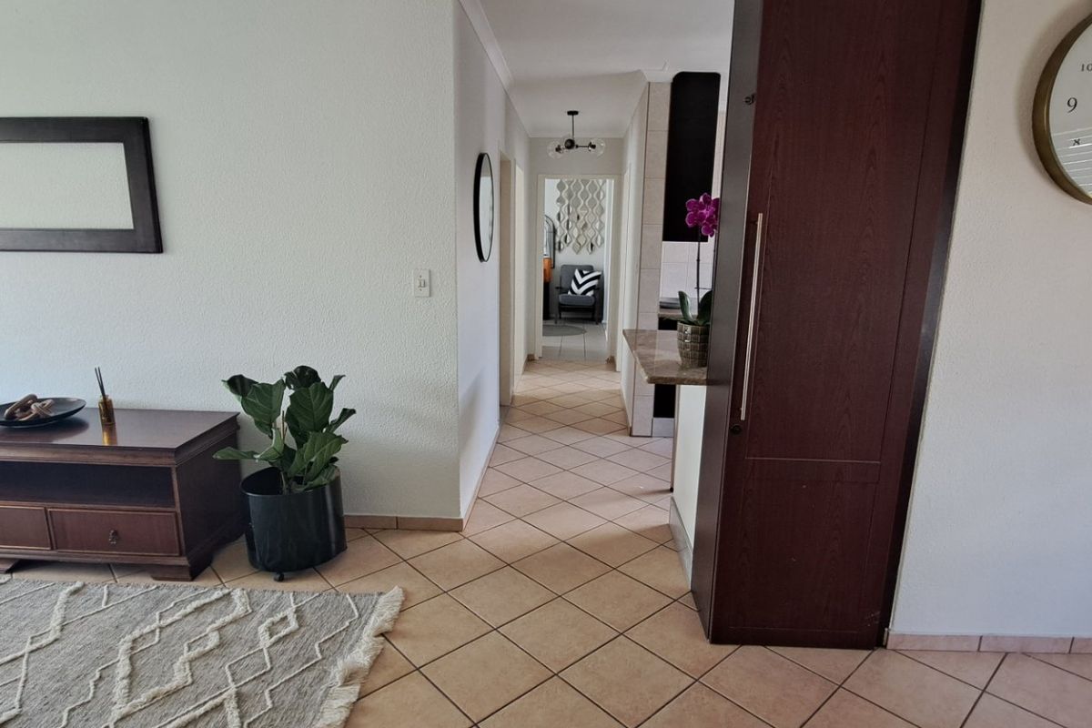 This beautifully renovated simplex is a must-see for discerning buyers seeking comfort, style, and security.  - Photo 3