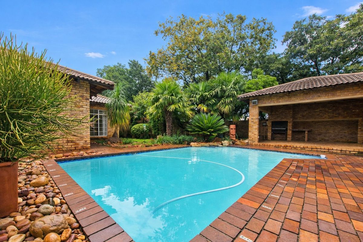 Modern 4 Bedroom Home with Pool, Solar & 3 Garages in Secure East Village - Photo 3