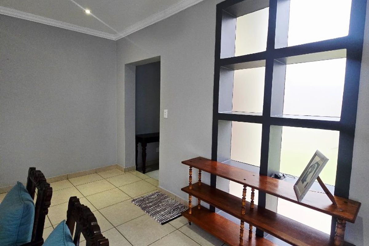 Inviting 3-Bedroom Home in a Secure and Family-Friendly Environment - Photo 4