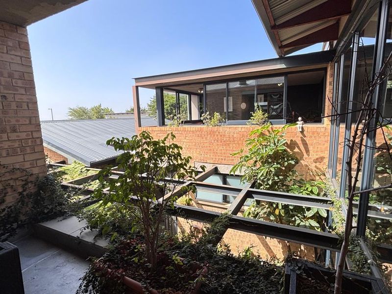 Experience architectural excellence in Midstream Ridge - Photo 2