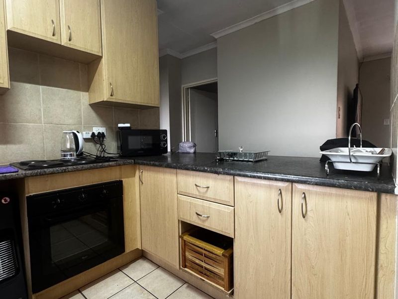 COMPLEX CONVENIENCE AT ITS BEST - Photo 6