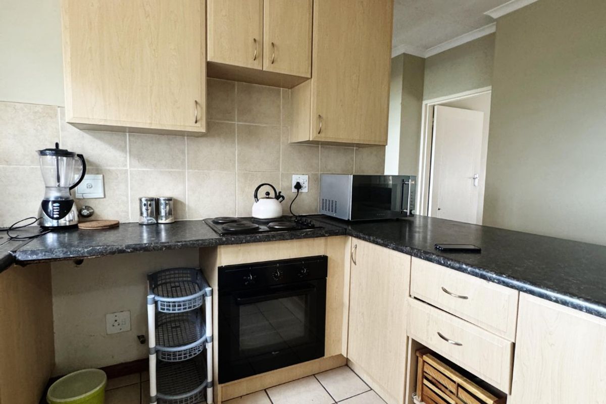 COMPLEX CONVENIENCE AT ITS BEST - Photo 3