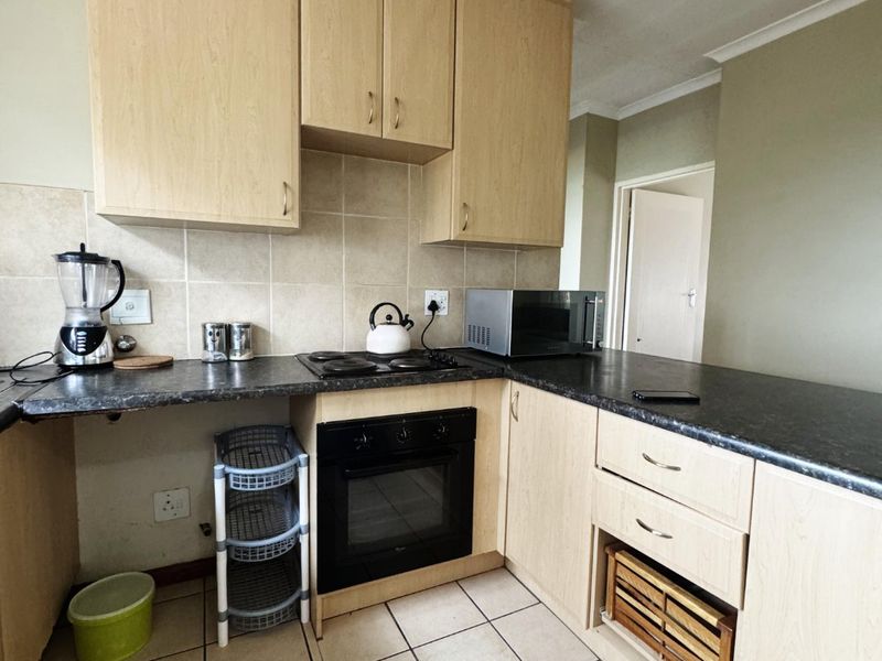 COMPLEX CONVENIENCE AT ITS BEST - Photo 3