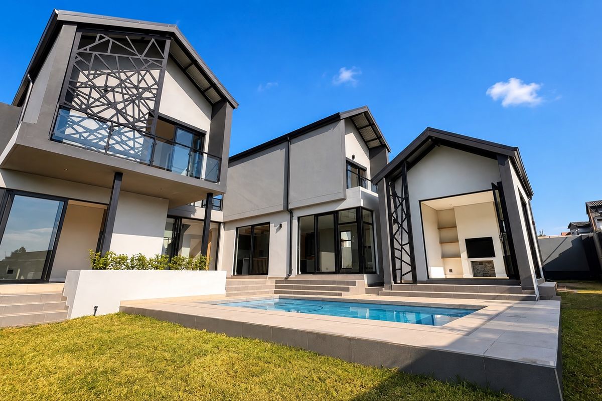 Modern rear exterior featuring a swimming pool, tiled patio area, and contemporary architectural design with large glass sliding doors and decorative metal screens.