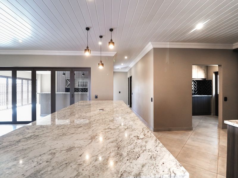 Modern 4-Bedroom Townhouse with Double Garage and Stunning Entertainment Area - Photo 9