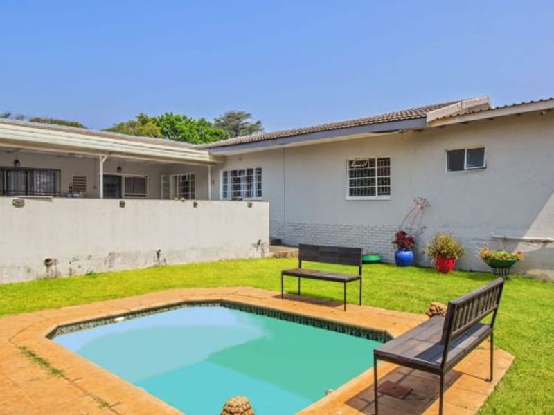 Versatile 4-Bedroom Home with 3 Income-Generating Flatlets & Entertainment Area - Photo 2