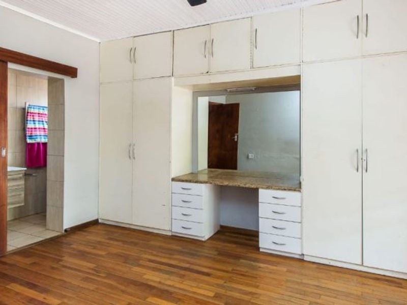 Versatile 4-Bedroom Home with 3 Income-Generating Flatlets & Entertainment Area - Photo 8