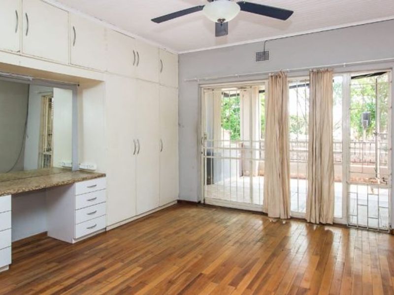 Versatile 4-Bedroom Home with 3 Income-Generating Flatlets & Entertainment Area - Photo 5