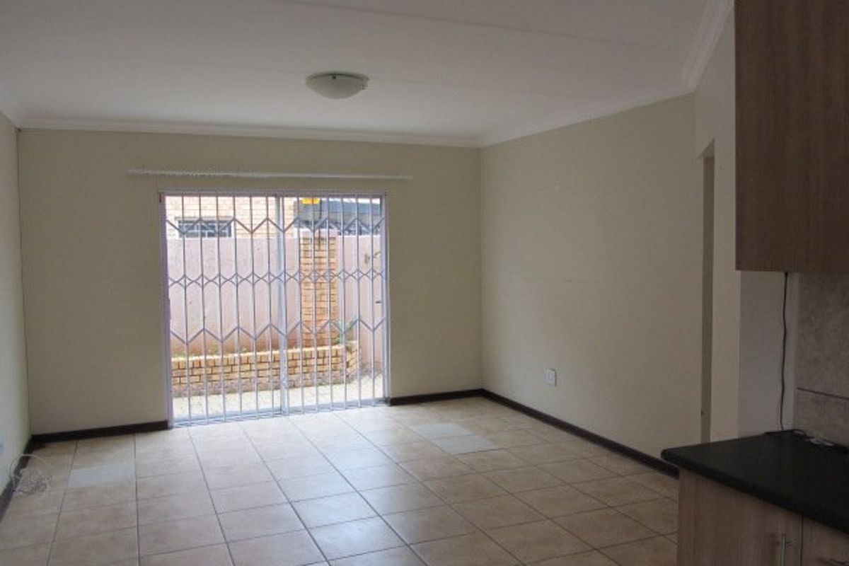 Ground floor unit with two  undercover vehicle parkings. - Photo 2