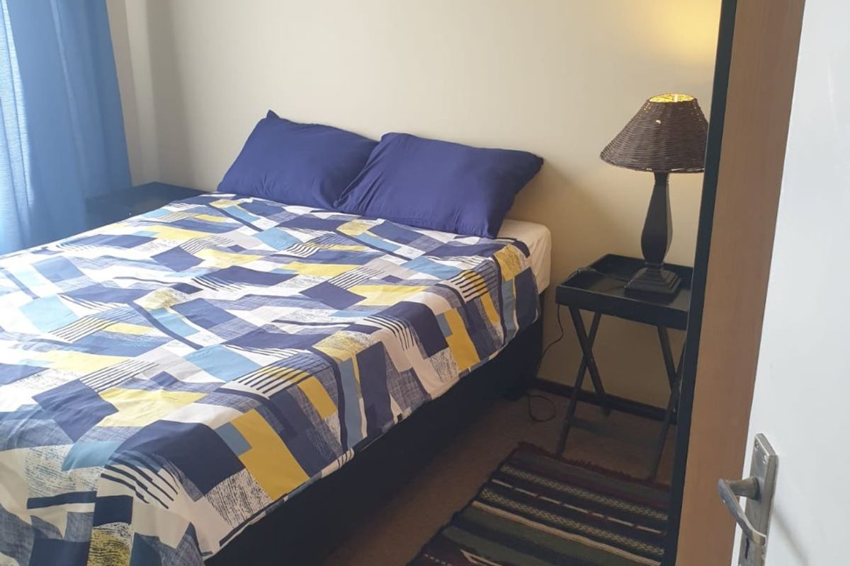 Step into comfort, style, and secure living with this charming 2-bedroom apartment nestled in a sought-after security complex. - Photo 4