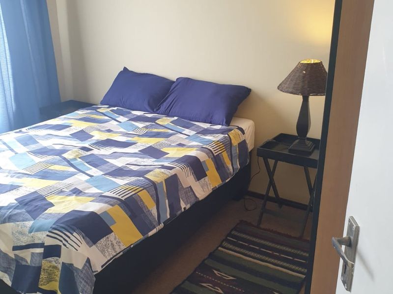 Step into comfort, style, and secure living with this charming 2-bedroom apartment nestled in a sought-after security complex. - Photo 4