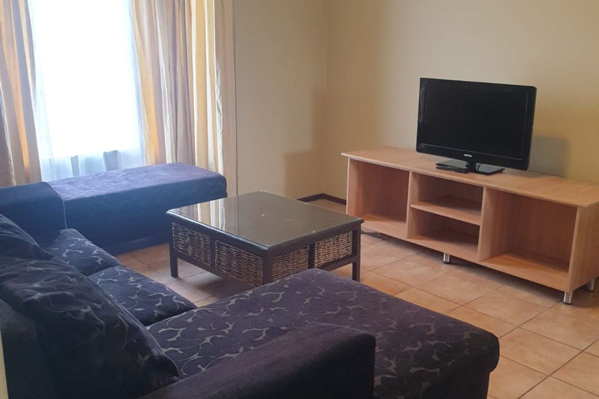 Step into comfort, style, and secure living with this charming 2-bedroom apartment nestled in a sought-after security complex. - Photo 3