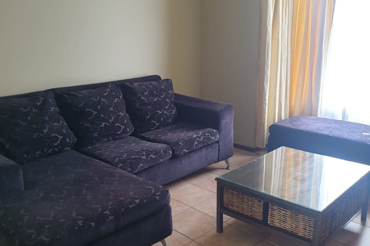 Step into comfort, style, and secure living with this charming 2-bedroom apartment nestled in a sought-after security complex. - Photo 2