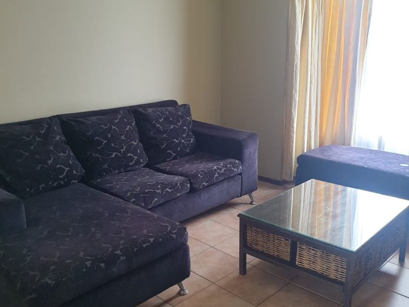 Step into comfort, style, and secure living with this charming 2-bedroom apartment nestled in a sought-after security complex. - Photo 2