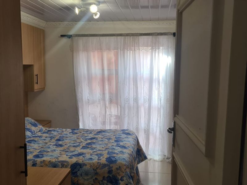 Modern 3-Bedroom Home with 2-Bedroom Granny Flat & Enclosed Braai Area - Photo 8