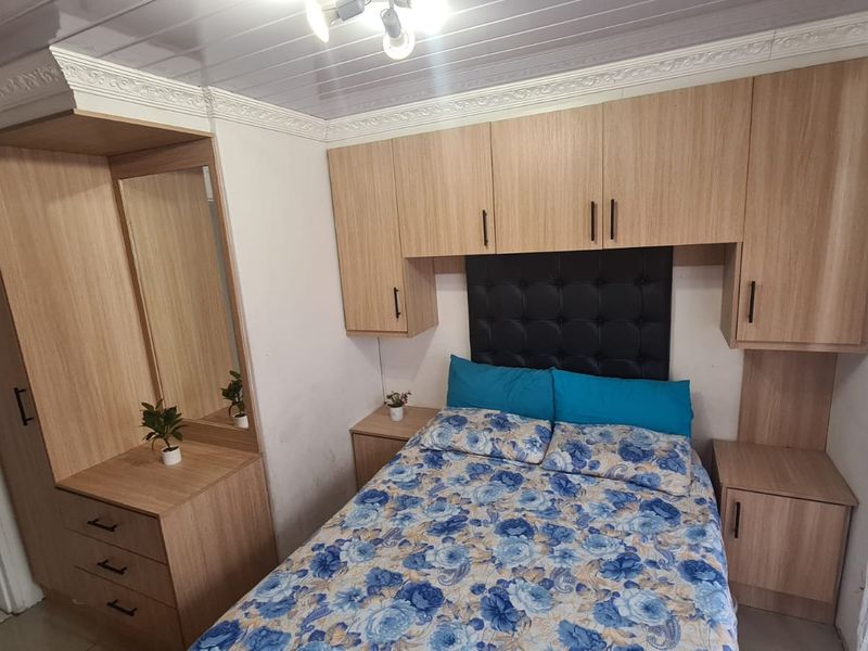 Modern 3-Bedroom Home with 2-Bedroom Granny Flat & Enclosed Braai Area - Photo 7