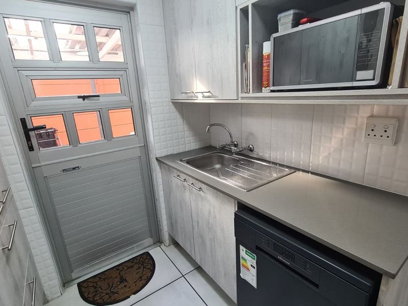 Modern 3-Bedroom Home with 2-Bedroom Granny Flat & Enclosed Braai Area - Photo 6