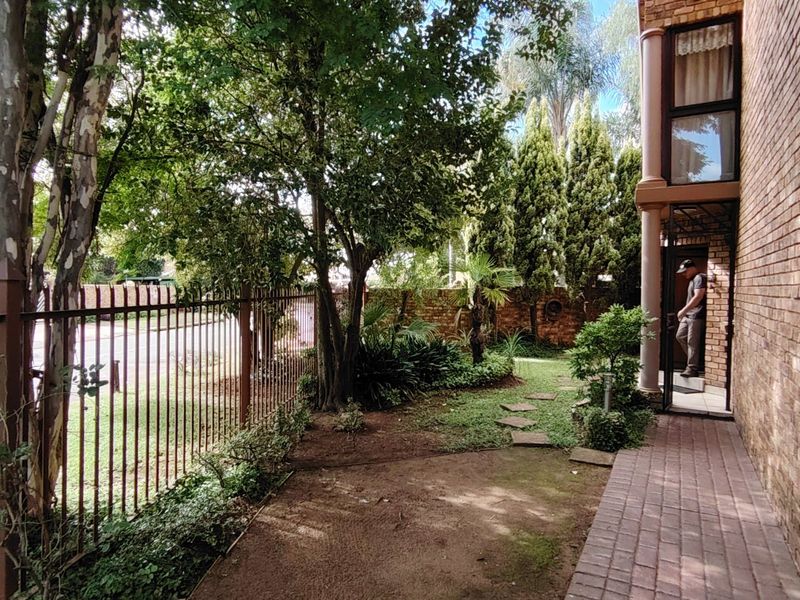 Secure Family Living with Income-Generating 2 Bedroom Flatlet in Eldoraigne Ext. 18 Boomed Area - Photo 7