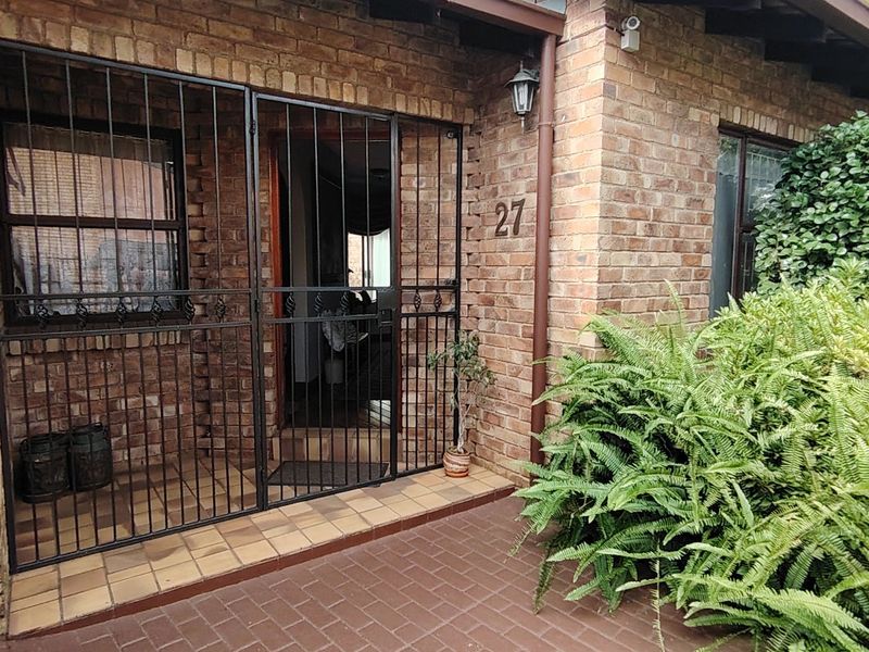 Secure Family Living with Income-Generating 2 Bedroom Flatlet in Eldoraigne Ext. 18 Boomed Area - Photo 6