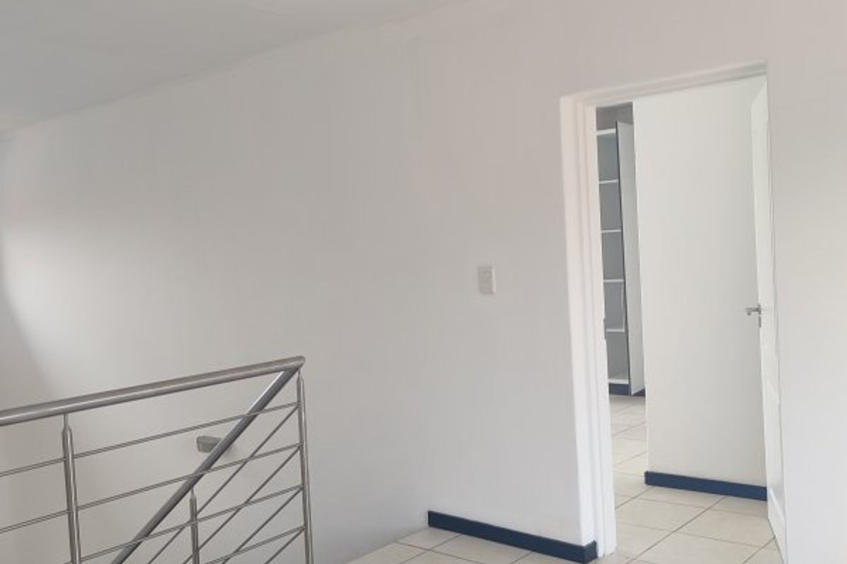 Modern Townhouse Living with Space & Security!  - Photo 4