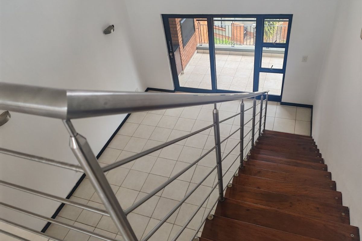 Modern Townhouse Living with Space & Security!  - Photo 3