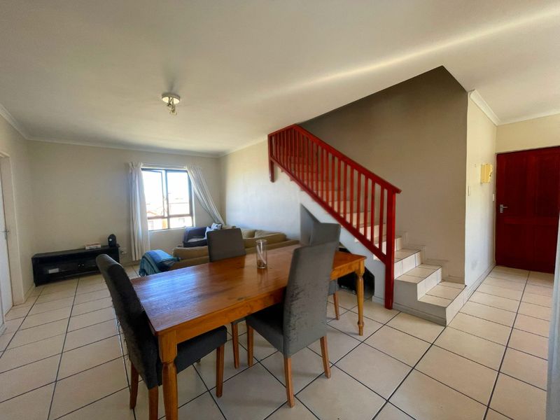 Spacious Top-Floor Retreat with Private Garage, Braai Balcony & Secure Living in Manhattan Park Complex - Photo 8