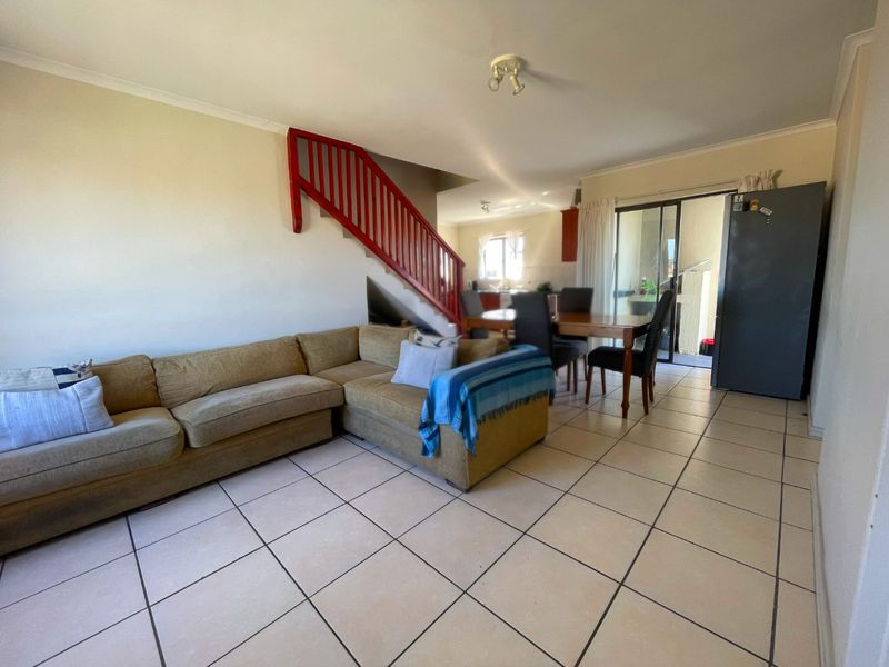 Spacious Top-Floor Retreat with Private Garage, Braai Balcony & Secure Living in Manhattan Park Complex - Photo 2