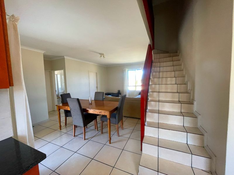 Spacious Top-Floor Retreat with Private Garage, Braai Balcony & Secure Living in Manhattan Park Complex - Photo 9