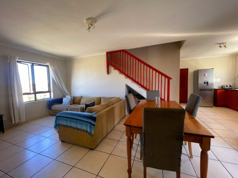 Spacious Top-Floor Retreat with Private Garage, Braai Balcony & Secure Living in Manhattan Park Complex - Photo 7